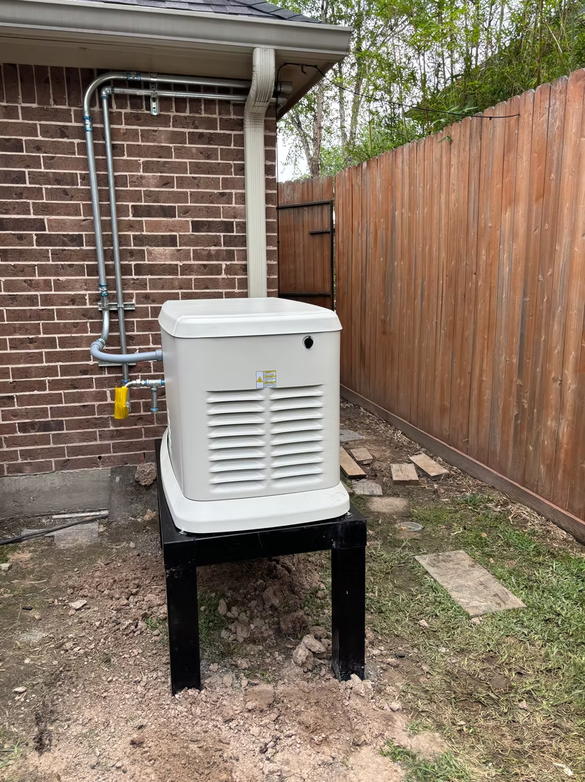 Whole-home generator on elevated stand with gas line installation